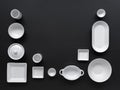 White, modern tableware in various designs on a black background Royalty Free Stock Photo