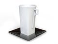 White modern tall cofee cup with black square saucer Royalty Free Stock Photo