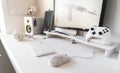 White modern wired gaming mouse in a white comfortable gamer workspace. Close-up of a special device Royalty Free Stock Photo
