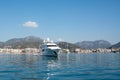 White modern yacht moored near Marmaris city in Turkey. Luxury white boat yacht on the background of the resort city Royalty Free Stock Photo