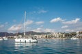 White modern yacht moored near Marmaris city in Turkey. Luxury white boat yacht on the background of the resort city Royalty Free Stock Photo