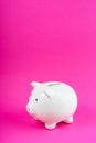 White Money Save Pig on Pink Background Copy Space Royalty Free Stock Photo