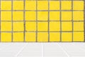 White mosaic floor and yellow mosaic wall Royalty Free Stock Photo