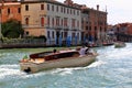 White motor boat with passengers in the Grand. Venice, Italy Royalty Free Stock Photo