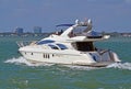 White Motor Yacht Cruising the Florida Intra-Coastal Waterway Off Miami Beach Royalty Free Stock Photo