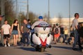 White motorcycle Victory Vision Tour in the pedestrian zone among people on a sunny evening Royalty Free Stock Photo