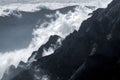 White mountain clouds above high peaks