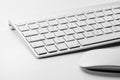 White mouse and keyboard of a personal computer on a white background