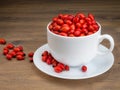 White mug filled with briar fruit