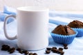 White mug mockup with chocolate muffins Royalty Free Stock Photo