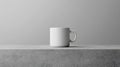 White Mug Sits on Stone Surface in Simple Minimalist Studio Setting Royalty Free Stock Photo