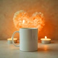 A white mug surrounded by lit candles with a blurred heart shape in the background on a white surface Royalty Free Stock Photo