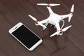 White Multicopter Drone with Mobile Phone. 3d Rendering Royalty Free Stock Photo