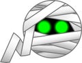 A white mummy wrapped up with green eyes