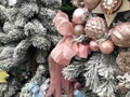 White Nacreous Glass New Year`S Ball And Snow-Covered Branches Of A Christmas Tree Royalty Free Stock Photo