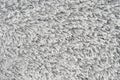 White natural fleece carpet texture background. Wool fabric texture fragment shaggy mat Royalty Free Stock Photo