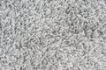 White natural fleece carpet texture background. Wool fabric texture fragment shaggy mat Royalty Free Stock Photo