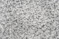 White natural fleece carpet texture background. Wool fabric texture fragment shaggy mat Royalty Free Stock Photo