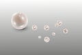 White natural pearls in mother-of-pearl color isolated on a black background. Royalty Free Stock Photo