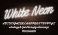 White Neon script alphabet font. Neon color lowercase and uppercase bright letters and numbers. Royalty Free Stock Photo