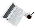 White Netbook With Coffee Top View