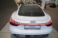 white new Luxury Electric Car Audi e-tron GT, taillights, limousine rear view in showroom, Automotive Innovation in automotive