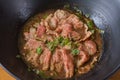 White noodle soup with meatball and beef stewed served in a black bowl. In Thailand, we call this food Royalty Free Stock Photo