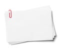 White note papers with red clip. Royalty Free Stock Photo