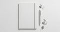 Blank White Notebook and Minimalist Office Supplies Flat Lay Royalty Free Stock Photo