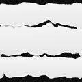 White oblong paper strips placed one over another with torn edge in horizontal position, paper for note are on black