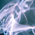 White and ocean blue abstract background - Trail of smoke on a dark background - creative colour effects with smoke smudges Royalty Free Stock Photo