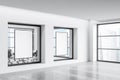 White office corridor with two mockups in windows. Corner view Royalty Free Stock Photo