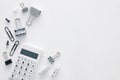 White office desk table with calculator and other office supplies. Top view Royalty Free Stock Photo