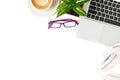 White office desk table with laptop computer, Latte art hot coffee and eye glasses Royalty Free Stock Photo