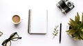 White office desk table with laptop, smartphone, coffee cup and other work supplies. Top view with copy space, flat lay. Royalty Free Stock Photo