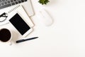 White office desk table with laptop, and smartphone and pen with coffee cup, copy space Royalty Free Stock Photo