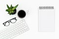 White office desk table layout. computer keyboard, glasses, coffee and note paper. copy space. flat lay Royalty Free Stock Photo
