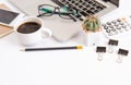 White office desk table, workspace office with laptop, smartphone black screen, coffee cup,pen,calculator, glasses, Top view with Royalty Free Stock Photo