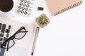 White office desk table, workspace office with laptop, smartphone black screen, coffee cup,pen,calculator, glasses, Top view with Royalty Free Stock Photo