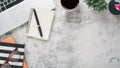 White office desk workplace with laptop computer, notebook, eyeglass, pen and cup of coffee. Royalty Free Stock Photo