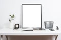 white office interior, stylish work table space with poster artw