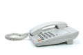 White office phone with handset on-hook Royalty Free Stock Photo