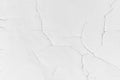 White old cracked surface with many cracks wall pattern texture abstract background