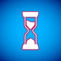 White Old hourglass with flowing sand icon isolated on blue background. Sand clock sign. Business and time management Royalty Free Stock Photo