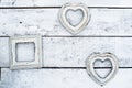 white old photo frames on a wooden background. in the shape of a heart. wall, interior Royalty Free Stock Photo