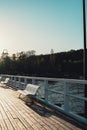 White Old wood bridge pier against beautiful sunset sky natural background, backdrop wallpaper multipurpose sea scene Royalty Free Stock Photo