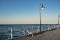 White Old wood bridge pier against beautiful sunset sky natural background, backdrop wallpaper multipurpose sea scene Royalty Free Stock Photo