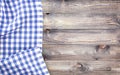 White old wooden table with blue checkered tablecloth, top view with copy space Royalty Free Stock Photo