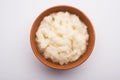 White Onion Puree or Paste in a bowl with raw whole