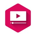 White Online play video icon isolated with long shadow. Film strip with play sign. Pink hexagon button. Vector